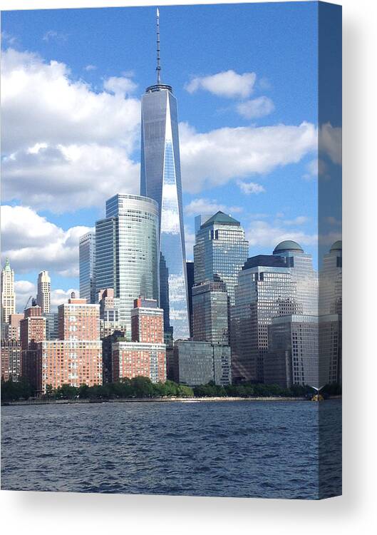 Puffy Clouds Canvas Print featuring the photograph One World Trade Center 1776ft by Tom Wurl