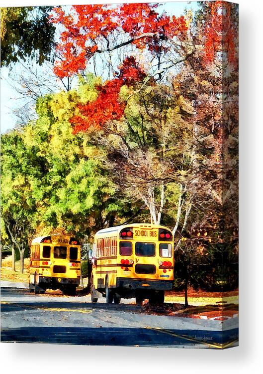 Bus Canvas Print featuring the photograph Parked School Buses by Susan Savad