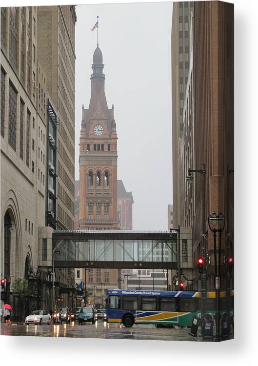 Milwaukee Canvas Print featuring the photograph Rain City Hall and Bus by Anita Burgermeister