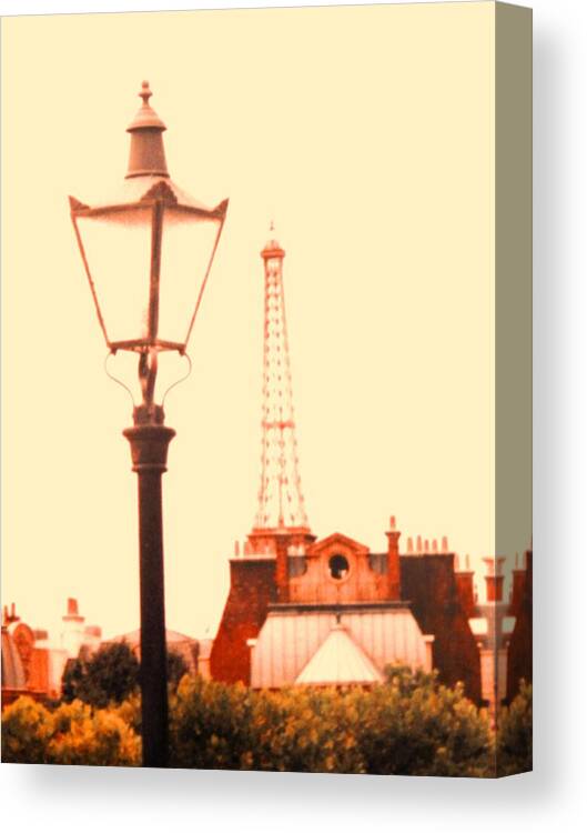 Sepia Tones Of A Lamp Post In The Fore Ground And The Eifel Tower In The Back Ground Canvas Print featuring the photograph Romantic Paris by Belinda Lee