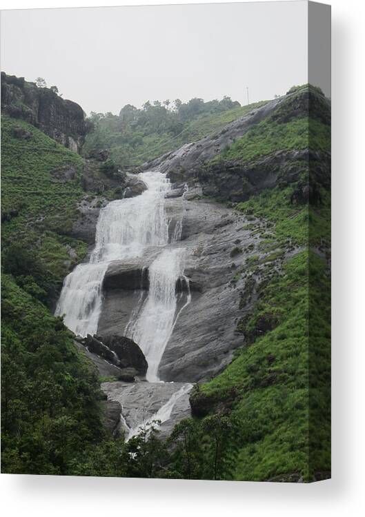 Water Fall Canvas Print featuring the photograph Small water fall by Biby Azhakathu