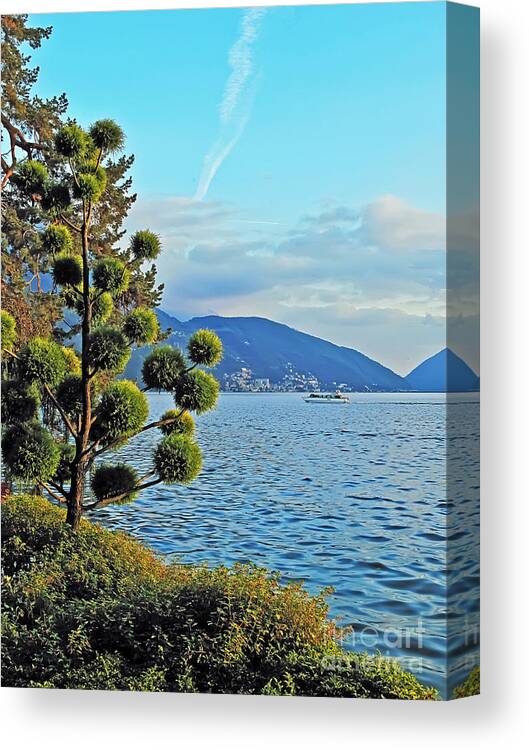 Travel Canvas Print featuring the photograph Swiss Lake by Elvis Vaughn