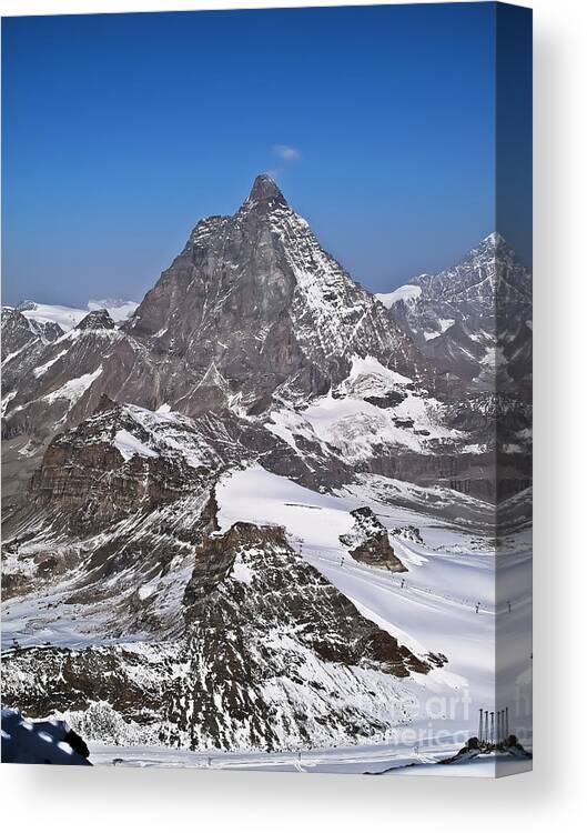 Travel Canvas Print featuring the photograph Skiing Under the Matterhorn by Elvis Vaughn