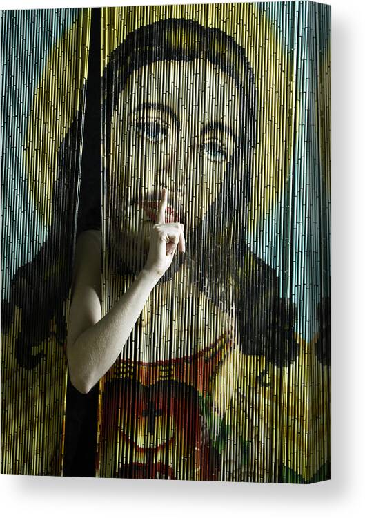 Finger On Lips Canvas Print featuring the photograph Woman indicating 'quiet' through beaded curtain with image of Jesus by Hans Neleman