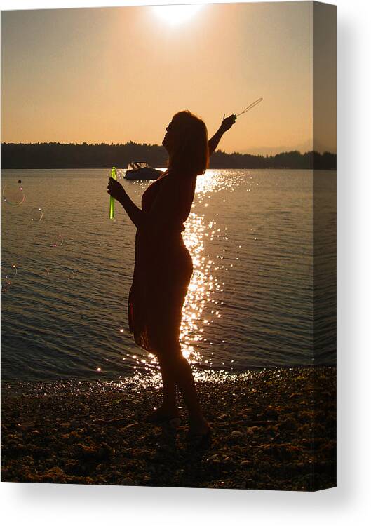 Sunset Canvas Print featuring the photograph She Blows Bubbles by Kym Backland