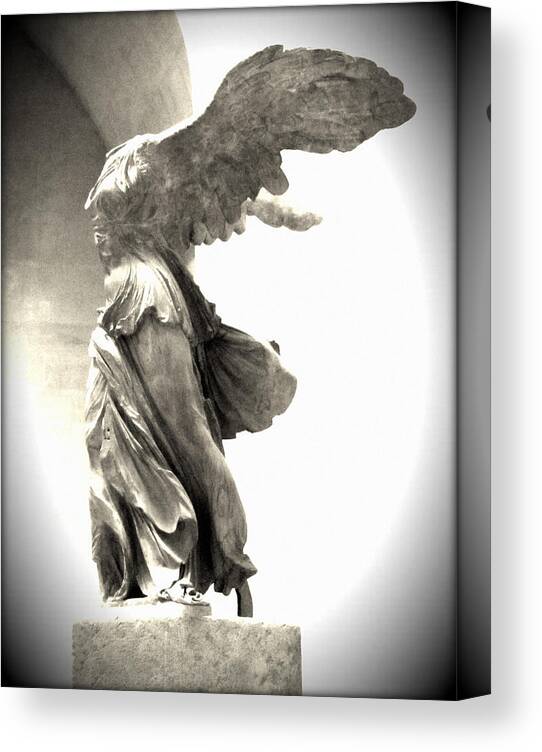 The Winged Victory Canvas Print featuring the photograph The Winged Victory - Paris Louvre by Marianna Mills