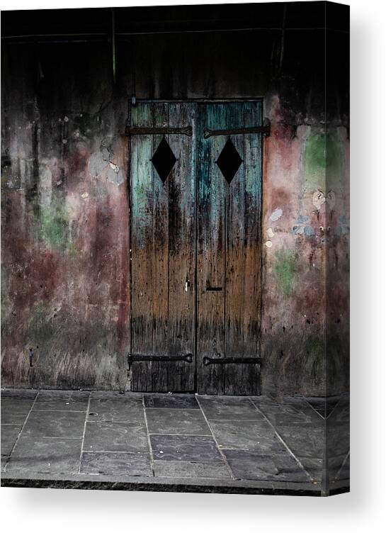 Door Canvas Print featuring the photograph Aged and erie door by Jeff Kurtz