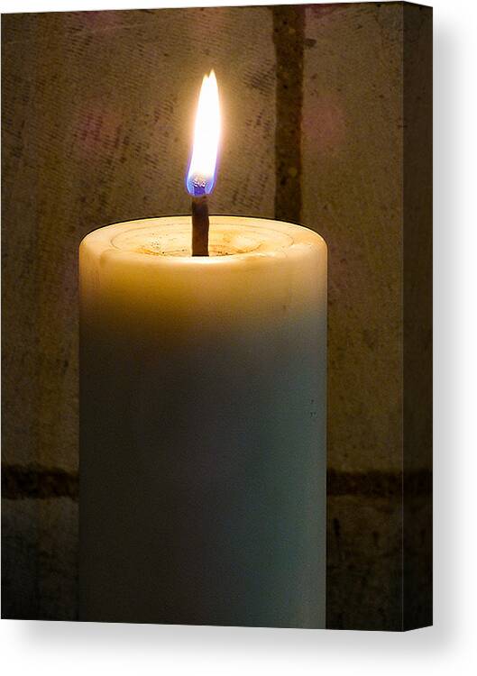 Alight; Blue; Brown; Burning; Candle; Fire; Light; Night; Stone; Texture; Wall; White; Yellow; Flame Canvas Print featuring the photograph Candle Light by Steve Taylor
