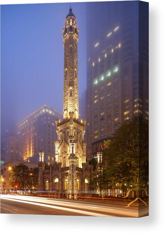 Windy Canvas Print featuring the photograph Chicago Historic Water Tower On Michigan Avenue Foggy Twilight - Chicago Illinois by Silvio Ligutti