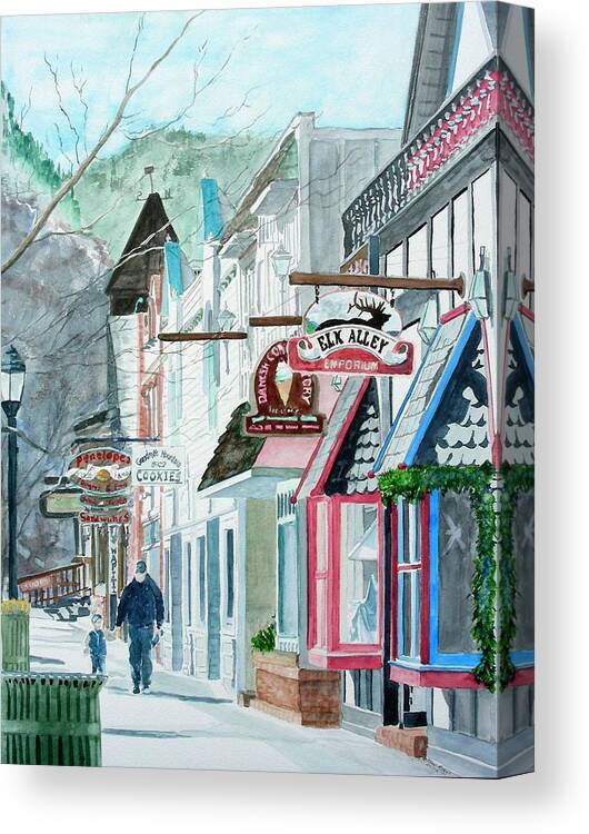 Watercolor Canvas Print featuring the painting Downtown Estes Park Winter by Tom Riggs