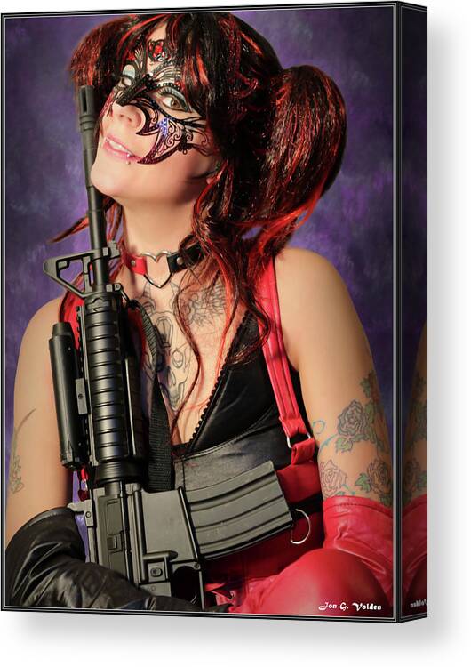 Harlequin Canvas Print featuring the photograph Harlequin With Gun by Jon Volden
