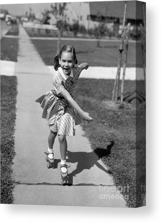 1950s Canvas Print featuring the photograph Little Girl Roller-skating On Sidewalk by Debrocke/ClassicStock
