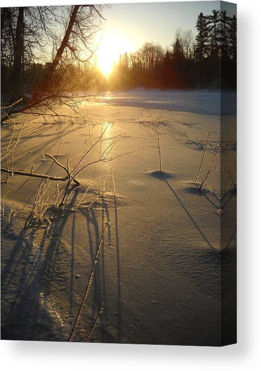 Ice Canvas Print featuring the photograph Sunrise Reflecting off Mississippi River Ice by Kent Lorentzen
