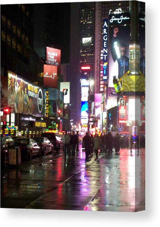 Times Square Canvas Print featuring the photograph Times Square in the rain 1 by Anita Burgermeister