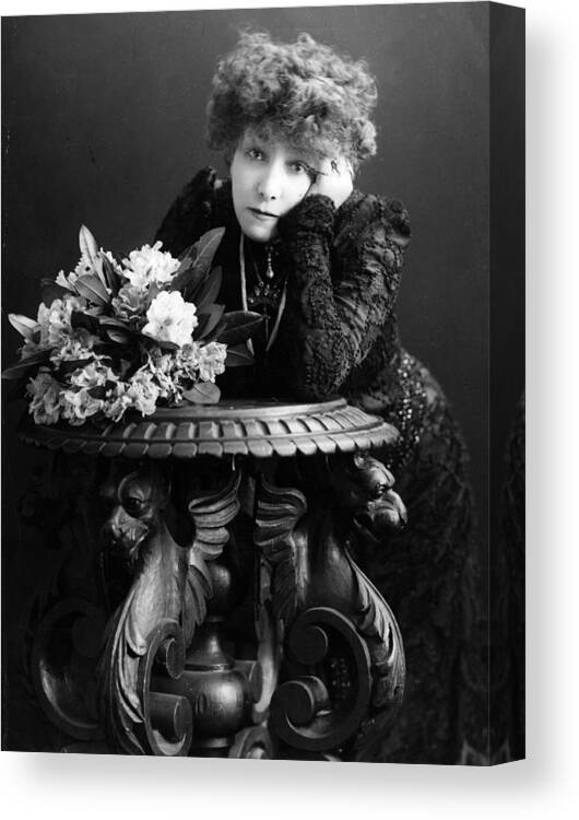 Sarah Bernhardt Canvas Print featuring the photograph Bernhardt And Table by Hulton Archive