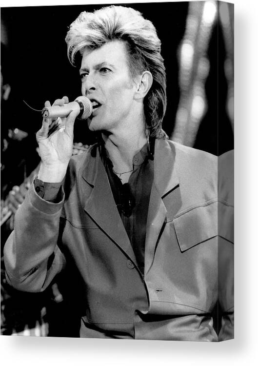 1980s Canvas Print featuring the photograph David Bowie Singing Into Microphone by Globe Photos