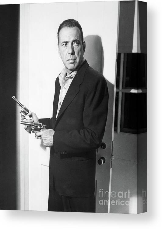 Releasing Canvas Print featuring the photograph Humphrey Bogart In Movie Still by Bettmann