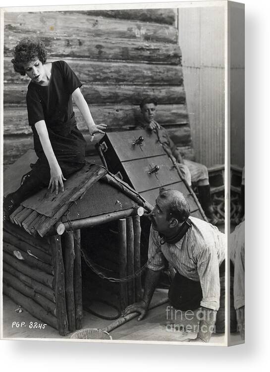 People Canvas Print featuring the photograph Man In The Dog House by Bettmann