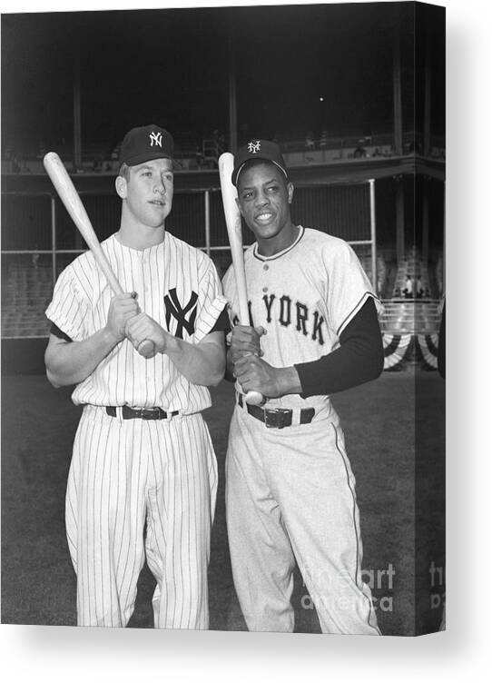 People Canvas Print featuring the photograph Mickey Mantle Poses With Willie Mays by Bettmann