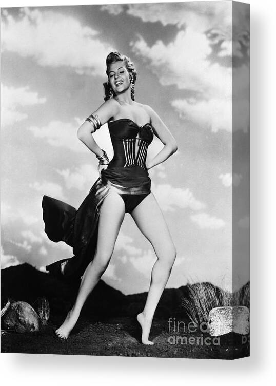 Singer Canvas Print featuring the photograph Rita Hayworth Dancing With Skirt Raised by Bettmann