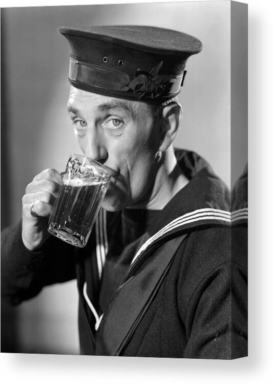 Sailor Drinking Beer Canvas Print / Canvas Art by Fox Photos