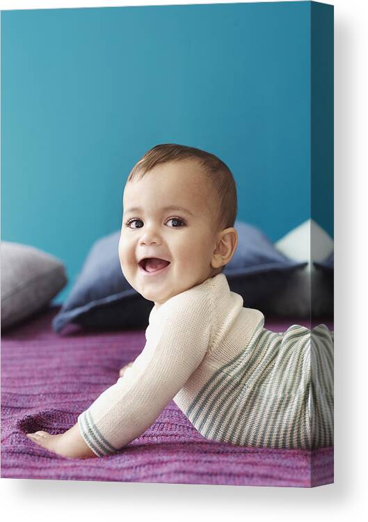 Toddler Canvas Print featuring the photograph Baby Holding Himself Up and Smiling by Alexandra Grablewski