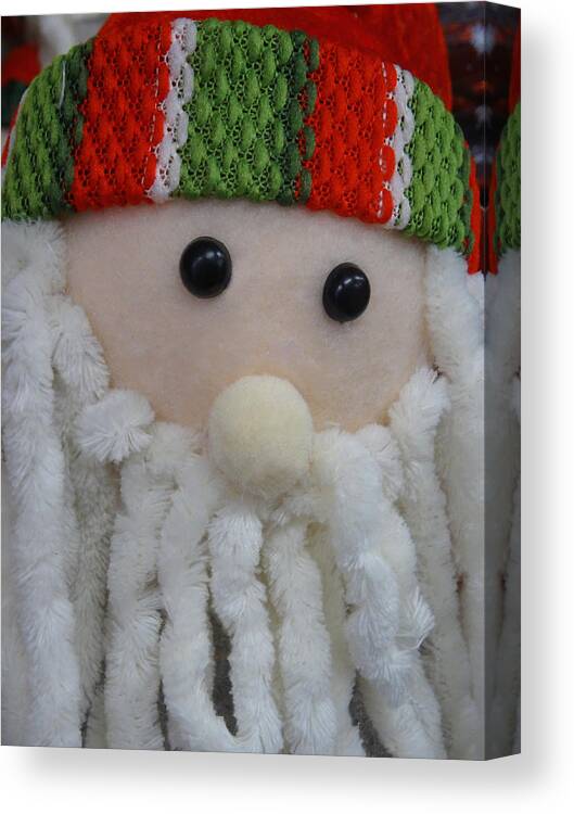 People Canvas Print featuring the photograph Cuddly toy cartoon Santa Claus / Father Christmas, dreadlocks white-beard, by Mtreasure