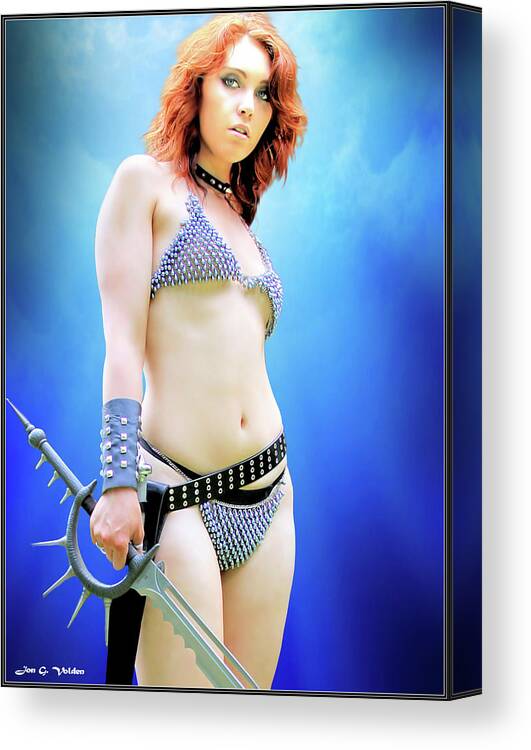 Sword Canvas Print featuring the photograph Sword and Chain Mail Bikini by Jon Volden
