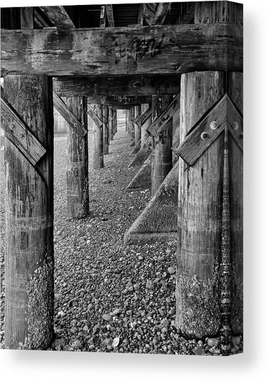 Black And White Canvas Print featuring the photograph Under the Poulsbo Boardwalk bw by Jerry Abbott