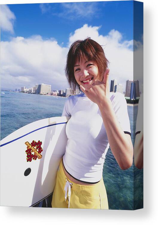 Holding Canvas Print featuring the photograph Young woman with paddleboard, portrait by Dex Image