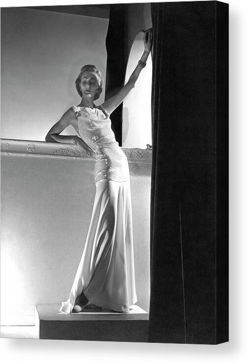 Designer Canvas Print featuring the photograph A Model Wearing A Sweater And Skirt by Horst P. Horst