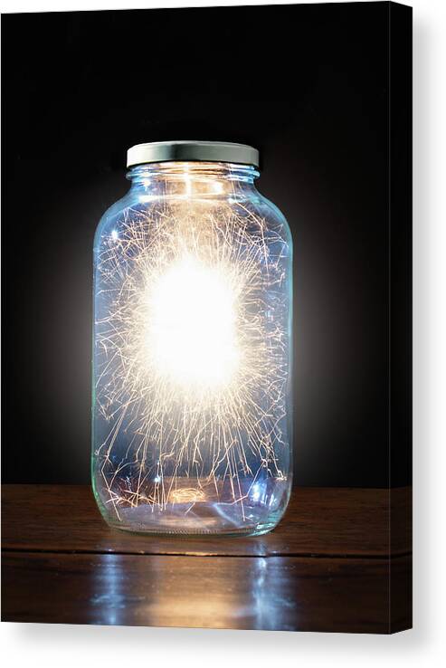 Black Background Canvas Print featuring the photograph Energy Trapped In Jar by Pm Images