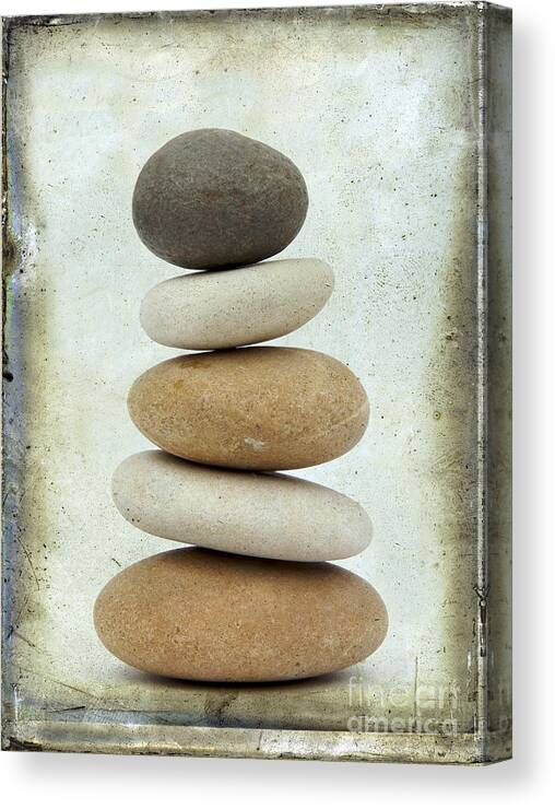 Studio Shot Canvas Print featuring the photograph Pile of pebbles by Bernard Jaubert