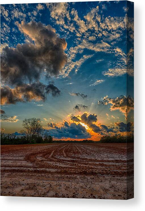 Sunset Canvas Print featuring the photograph Breaking Through by Brad Boland