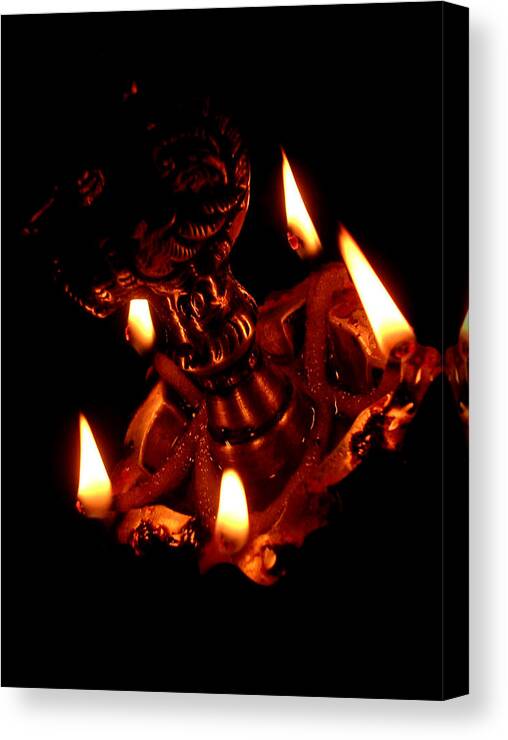 Black Background Canvas Print featuring the photograph A Traditional South Indian Lamp by By Chandrachoodan Gopalakrishnan