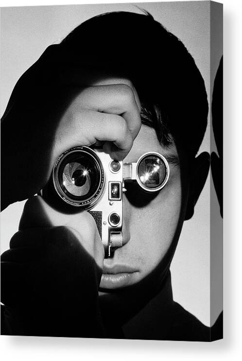 Dennis Stock Canvas Print featuring the photograph Dennis Stock with Camera by Andreas Feininger