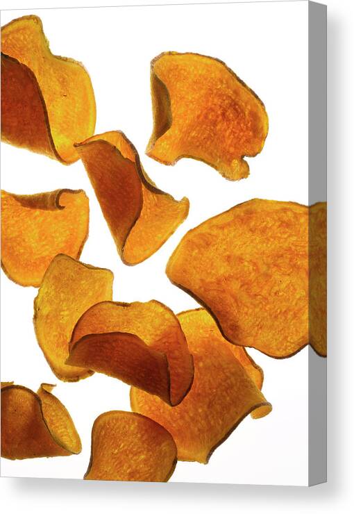 Unhealthy Eating Canvas Print featuring the photograph Flying Sweet Potato Chips by Howard Bjornson