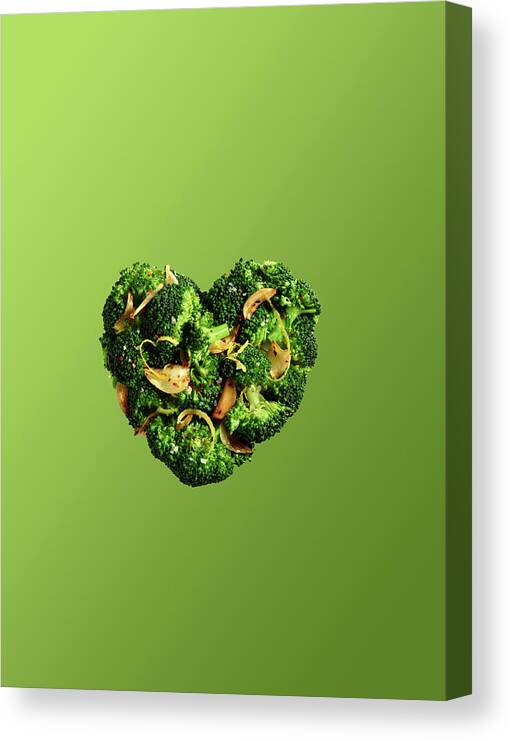 Broccoli Canvas Print featuring the photograph Heart Shaped Broccoli On Green by Maren Caruso