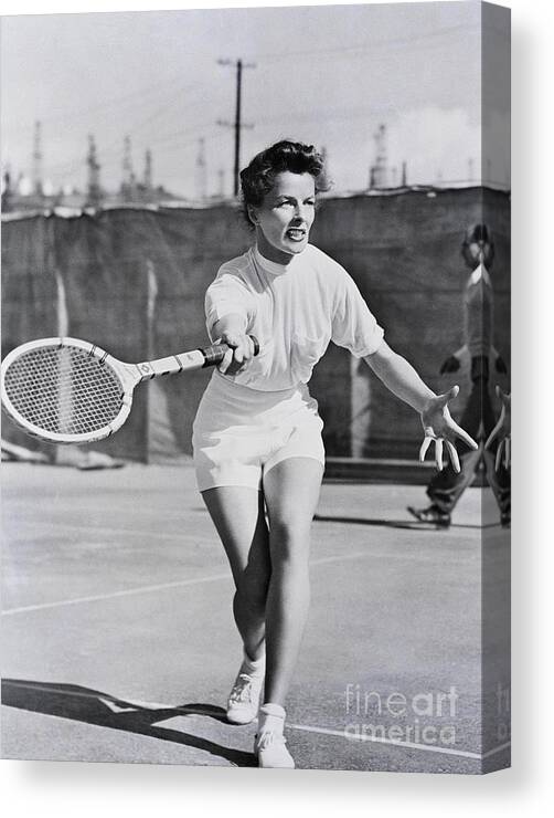 Tennis Canvas Print featuring the photograph Katharine Hepburn Playing Tennis by Bettmann
