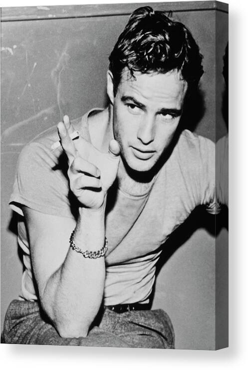 Smoking Canvas Print featuring the photograph Marlon Brando by Archive Photos