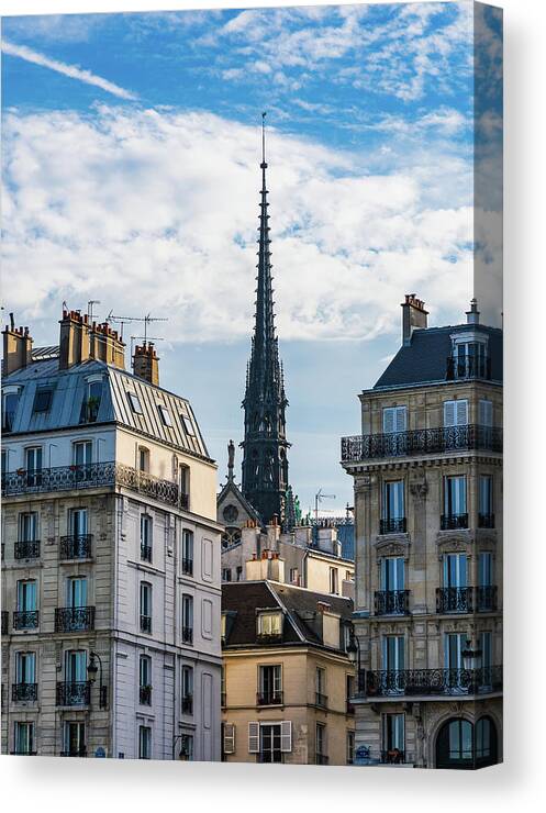 Notre Dame Canvas Print featuring the photograph The Spire of Notre Dame by Liz Albro
