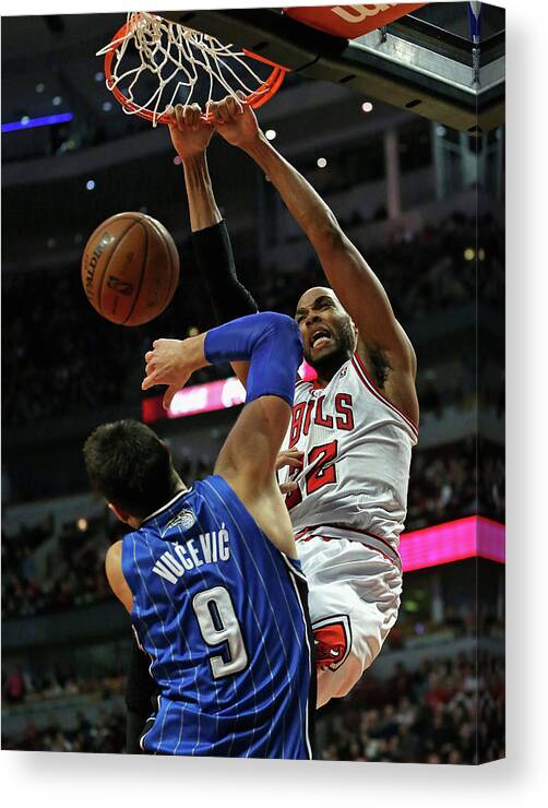 Chicago Bulls Canvas Print featuring the photograph Taj Gibson #1 by Jonathan Daniel