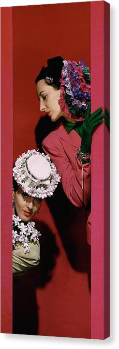 Accessories Canvas Print featuring the photograph Models Wearing Hats by John Rawlings