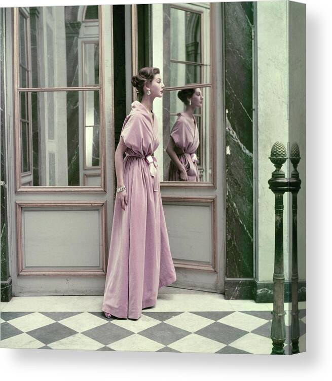 One Person Canvas Print featuring the photograph Model Wearing A Pink Gown By Balenciaga by Frances McLaughlin-Gill