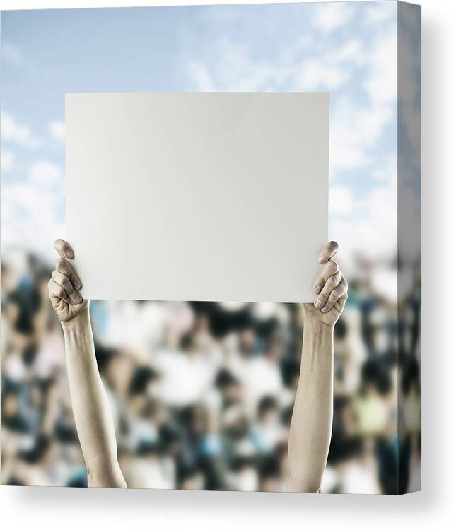 Event Canvas Print featuring the photograph Person in crowd holding blank sign by Colin Anderson Productions pty ltd