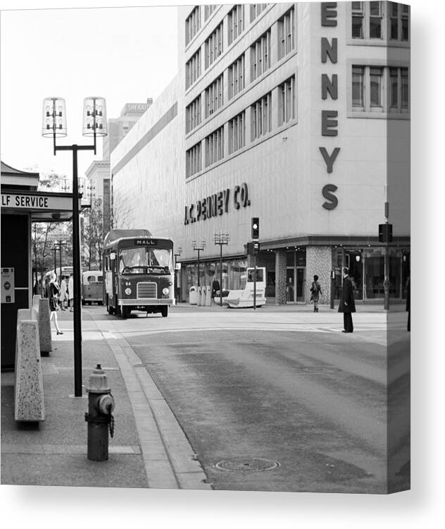 Book Work Canvas Print featuring the photograph Penney's on the Mall by Mike Evangelist
