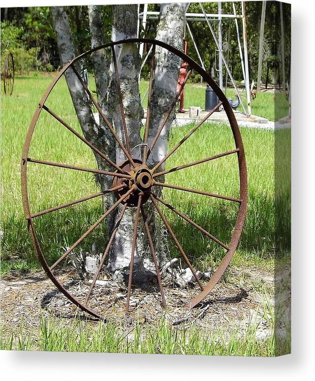 Old Wheel Canvas Print featuring the photograph Rusty Wheel by D Hackett