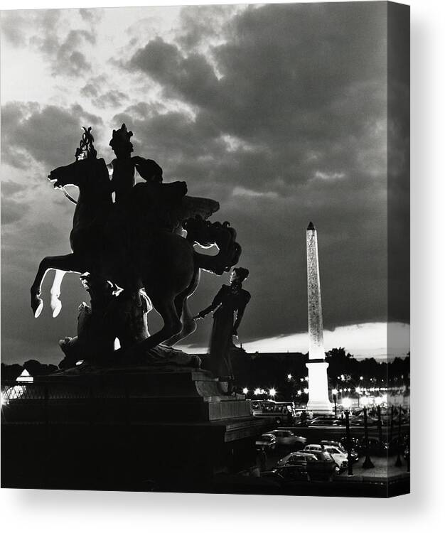 Paris Canvas Print featuring the photograph Silhouette Of Model By Statue In Paris by Horst P Horst