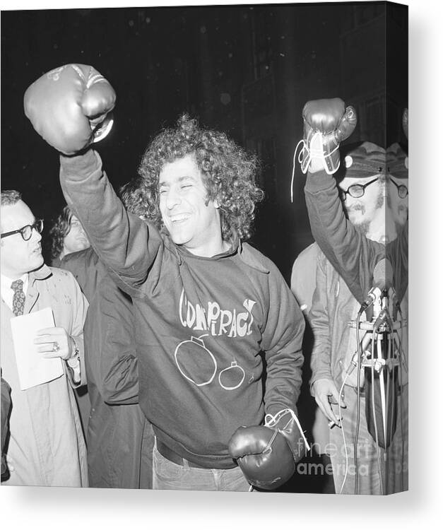 People Canvas Print featuring the photograph Abbie Hoffman And Friend Talk To Press by Bettmann