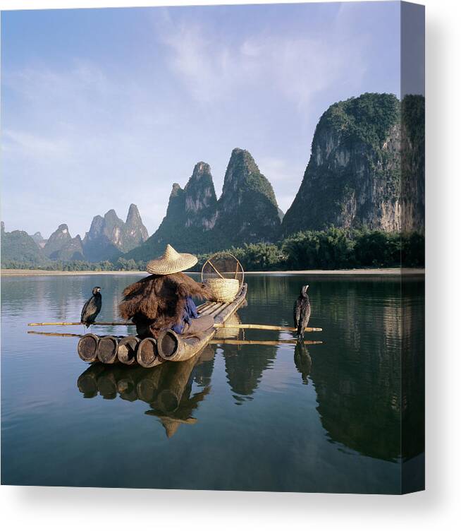 Three Quarter Length Canvas Print featuring the photograph Comerant Fisherman On Li River by Martin Puddy